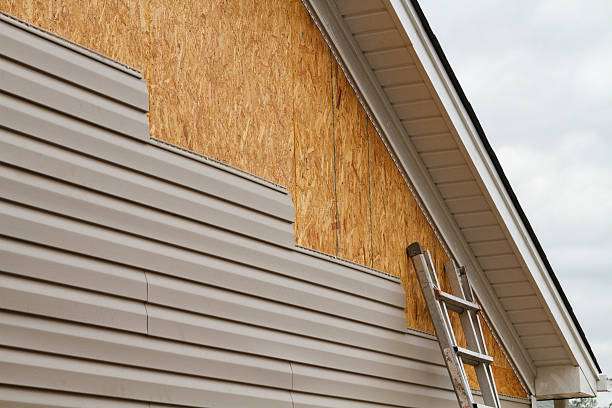 Professional Siding technician working in Manchester, PA